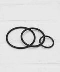 Drive Belt Set For EMCO Unimat 3 And Unimat 4 Lathes Nitrile Rubber Replacement Belts Three Piece Kit shown in black circles.