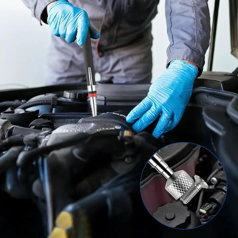 Mechanic using Six Piece Telescopic Magnetic Pick Up Tool Set With Non Slip Handles Extendable Wands for grabbing screws in engine
