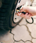 Tough As Nails Air Pump Hose Adapter Quick Connect Replacement For Tire Inflator With Durable Build And Anti Slip Grip To Ensure Safety While Inflating So You Can Hit The Road Without Leaks Being Stuck Roadside Safe And Sound. black hose connected to tire valve