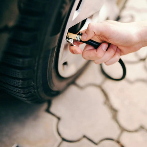 Tough As Nails Air Pump Hose Adapter Quick Connect Replacement For Tire Inflator With Durable Build And Anti Slip Grip To Ensure Safety While Inflating So You Can Hit The Road Without Leaks Being Stuck Roadside Safe And Sound. black hose connected to tire valve