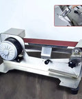 Knockout 600W Electric Knife Sharpener With Water Cooled Belt Sander And Variable Speed Wet Dry Grinder Featuring Polishing Wheel on wooden surface.