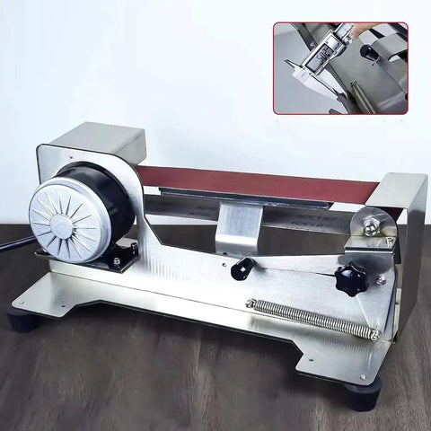 Knockout 600W Electric Knife Sharpener With Water Cooled Belt Sander And Variable Speed Wet Dry Grinder Featuring Polishing Wheel on wooden surface.