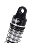 Close-up of 59mm Aluminum Oil Shock with Adjustable Damping featuring CNC machined aluminum and threaded shock body.