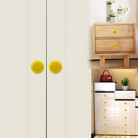 Top Shelf Handcrafted Ceramic Cabinet Knobs With A Slick Round Shape designed for kitchen and closet drawers, 28mm high, 38mm wide, yellow ceramic.