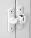 Matte White Aluminum Barn Door Latch Heavy Duty Gate Lock mounted on shed doors, showcasing secure locking mechanism and durable material.