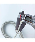 Slick 4-Core Coiled Power Cord With Rad Spiral Design Offering Seamless Electrical Connections And No Tangles Featuring Durable Polyurethane Jacket With Telescopic Flexibility For Sweet Moving Circuit Setups And Reliable Vertical Motion Apps, measuring with calipers.
