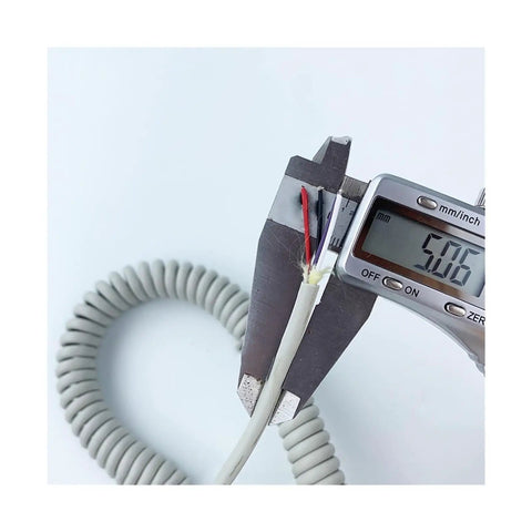 Slick 4-Core Coiled Power Cord With Rad Spiral Design Offering Seamless Electrical Connections And No Tangles Featuring Durable Polyurethane Jacket With Telescopic Flexibility For Sweet Moving Circuit Setups And Reliable Vertical Motion Apps, measuring with calipers.