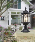 JUDYSSY Security Lights Outdoor/lot Led Flood Light Outdoor Floodlight Spotlight IP67 Waterproof on a decorative pedestal in a garden.