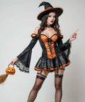 Premium Adjustable Black Leather Leg Harness For Women Gothic Punk Thigh Garter Strap With Elastic Band Club Rave Festival Body Chain Fresh Streetwear Fit worn with a witch costume, featuring black and orange colors.
