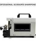 Professional Grade 220W Electric Scissors Sharpener that crushes dull blades, compact design for easy transport and daily use.