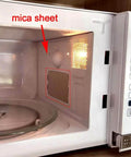 Installed mica sheet waveguide cover inside a microwave oven cavity, part of a Five Pack Waveguide Covers For Microwave Ovens Replacement Parts