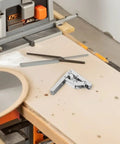 Wide Angle Cabinet Hinges Four Pack With Short Arm on a workshop table