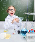 Child in lab coat doing experiment with Science Kit For Kids With Ready To Use Bacteria Petri Dishes LB Agar And Cotton Swabs