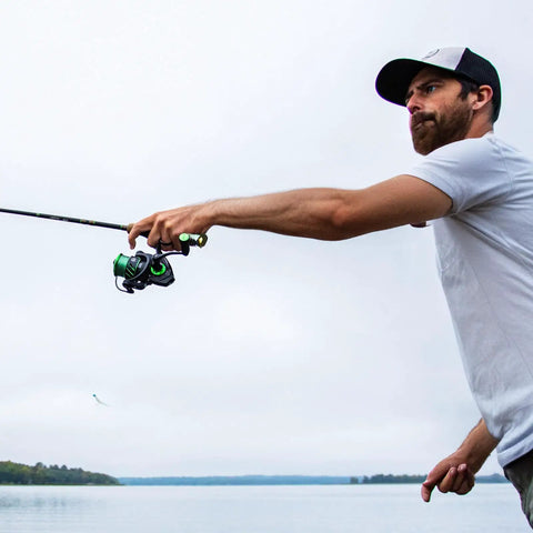 Person casting with Viper X Spinning Reel Ultralight With Six Point Two To One Gear Ratio Ten Plus One Ball Bearings Carbon Fiber Body