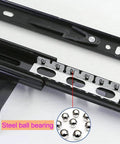 Close-up of heavy duty keyboard drawer slides showing steel ball bearings, part of the 10 or 12 inch three section full extension.