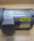 M3103 J DC Motor Three Phase 208 230 460V 3450 RPM M3101JDC industrial motor shown with nameplate on workbench