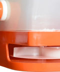 Close-up of Handheld Seed Spreader with One Gallon Capacity, showing easy one-turn operation mechanism in orange and white