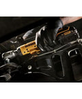 Cordless 12V Max Three Eighth Inch Drive Ratchet Wrench With Brushless Motor used in tight space with LED Work Light visible