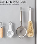Heavy Duty Magnetic Hooks With Neodymium Magnets For Tool Free No Drill Hanging In Kitchen Office Classroom Garage Cruise Ship And More Movable Reusable Hangers 12 Pack holding kitchen utensils