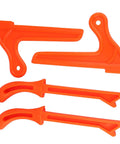 Bright orange ergonomic table saw push sticks in various shapes for safety in carpentry, woodworking, and preventing blade contact.