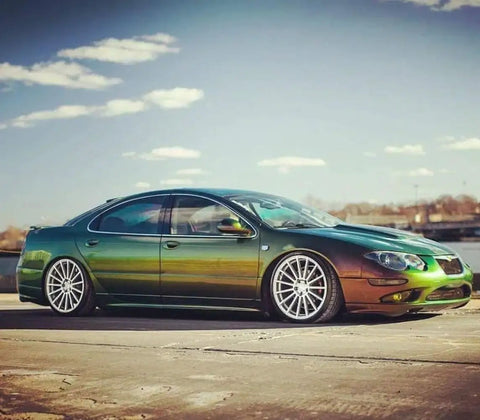 Killer Colorshift Pearl Auto Paint Basecoat Midcoat 128 Oz Gallon on custom vehicle finish showcasing color shift from teal to bronze.