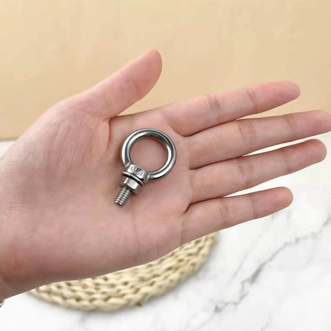 10 Pack M6 Eye Bolts With Nuts Stainless Steel 304 Beefy Heavy Duty Eyebolts For Lifting Rigging And Hanging Projects Closed Loop Eye Bolt With Screw Thread 0.22 Inch 0.55 Inch Shank Ring Shoulder Design held in hand