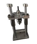 Vertical Drill Guide Attachment for Home Workshops with steel base and dual columns.
