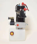 Compact 12V Or 24V Hydraulic Power Unit With.75L Reservoir For Electric Pallet Trucks, featuring a black motor and white reservoir.