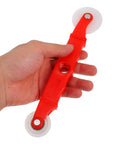 Hand holding red spline roller from Window Screen Repair Tool Kit Spline Roller Set For Quick And Precise Screen Fixes.