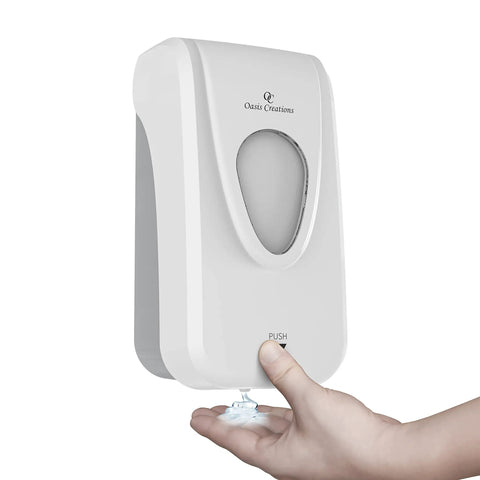 No Sweat Wall Mounted Manual Soap And Hand Sanitizer Dispenser 1000 Ml White Bulk Case Of Thirty dispensing sanitizer into a hand.