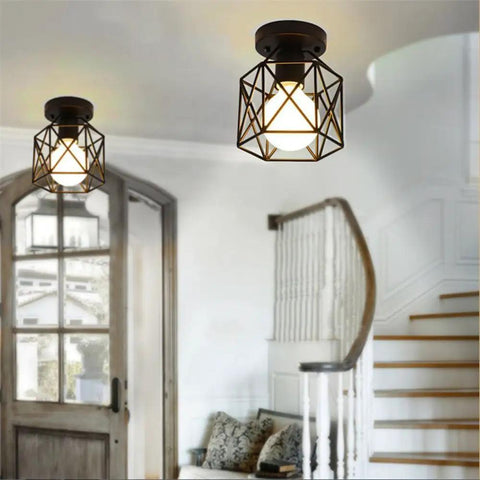 Dope Industrial Semi Flush Mount Ceiling Light Featuring A Sick Black Cage Design And Rustic Vintage Vibe illuminating entryway.