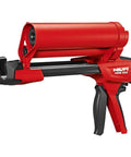 Red Manual Anchor Adhesive Dispenser With HIT-CR 500 And HIT-CB, pro-grade tool for construction mounting and wall anchoring.