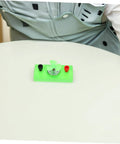 Dc Motor Diy Kit For Mini Wind Turbine Electric Generator Solar Powered Physics Project on a table with green platform
