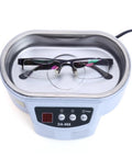 Dope Portable Digital Ultrasonic Cleaner 50W Dual Frequency Tub washes glasses in compact machine with control panel.
