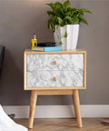 Ultra Wide Marble Contact Paper Peel And Stick For Countertops Desks And Tables 36x197 Inches on wooden nightstand with plant