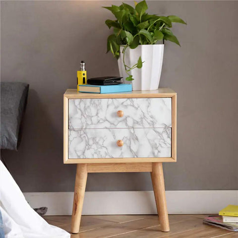 Ultra Wide Marble Contact Paper Peel And Stick For Countertops Desks And Tables 36x197 Inches on wooden nightstand with plant