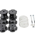 Delrin Rear Cradle Bushing Kit Boasting Zinc Coated Sleeves That Lock Out Deflection For Rock Solid Handling with black bushings and steel plates.