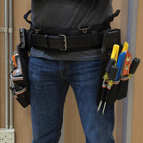 Person wearing Tradesman Pro Modular Trimming Pouch With Belt Clip For Click Lock System, tools held upright in pockets