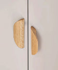 Oak Wood Oblique Angle 4.41 Inch Windbreaker Cabinet Door Handle In Antique Long Walnut Finish installed on cabinet doors