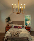 Gold 8 Light Farmhouse Chandelier With Modern Brass Candle Design for bedroom, ceiling mount, warm lighting, adjustable height.