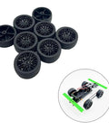 8 pack RC car wheels with rubber tires and round shaft axles, 3mm shaft, 35mm diameter, 14mm thick, shown with RC model