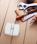 Self Closing Door Hinges For Public Restrooms Stainless Steel Adjustable Tension Springs with tools on wooden surface.