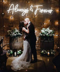 Couple kissing under Forever Neon Sign For Weddings And Parties, Cold White LED Wall Decor, romantic wedding backdrop