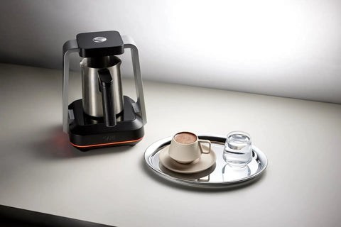 Turkish Coffee Maker Electric With Open Form Design For Watching Foam Rise And Savoring Aroma SandBrew Technology displayed on countertop