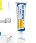Drywall Patch Repair Kit For Nail Holes And Cracks With Odorless Quick Drying Putty Non Shrinking Wall Paste Scraper And Nozzle Easy Doorknob Dent Fix DIY Home Repair Must Have 1 Set with tube, scraper, nozzle, and mesh tape.