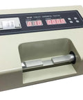 Pro Digital Tablet Hardness Tester With Automatic Statistical Printing And Led Display on a lab table with digital readout.