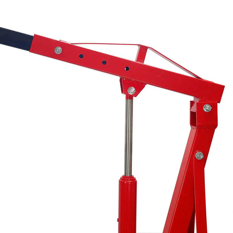 Close-up of Heavy Duty Hydraulic Engine Hoist Cherry Picker Shop Crane With Folding Design, showing red steel arm and hydraulic cylinder.