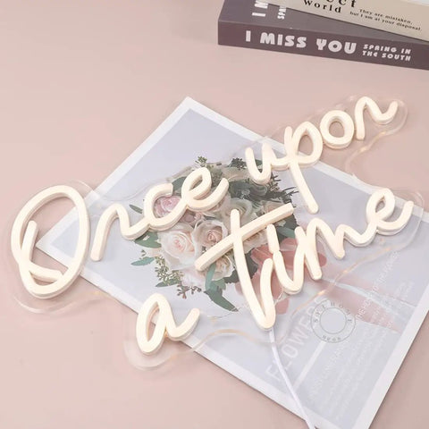 Once Upon A Time Neon LED Light Sign Warm White 15.8 Inch By 8.9 Inch USB Powered 5V Wall Or Table Decor on pink surface