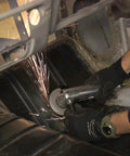 Pro Grade 4 Inch Pneumatic Air Angle Grinder With High Torque Ball Bearing Motor in use on auto body, sparks flying.