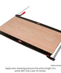 Phenolic Clamping Cauls 24 Inch 2 Pack Cambered Design Delivers Even Pressure For Flat Panel Glue Ups, Boss Level Shop Grade Durability, Built Tough For Precise SnipeFree Woodworking Glue Ups. 24-inch phenolic cauls clamping a wood panel